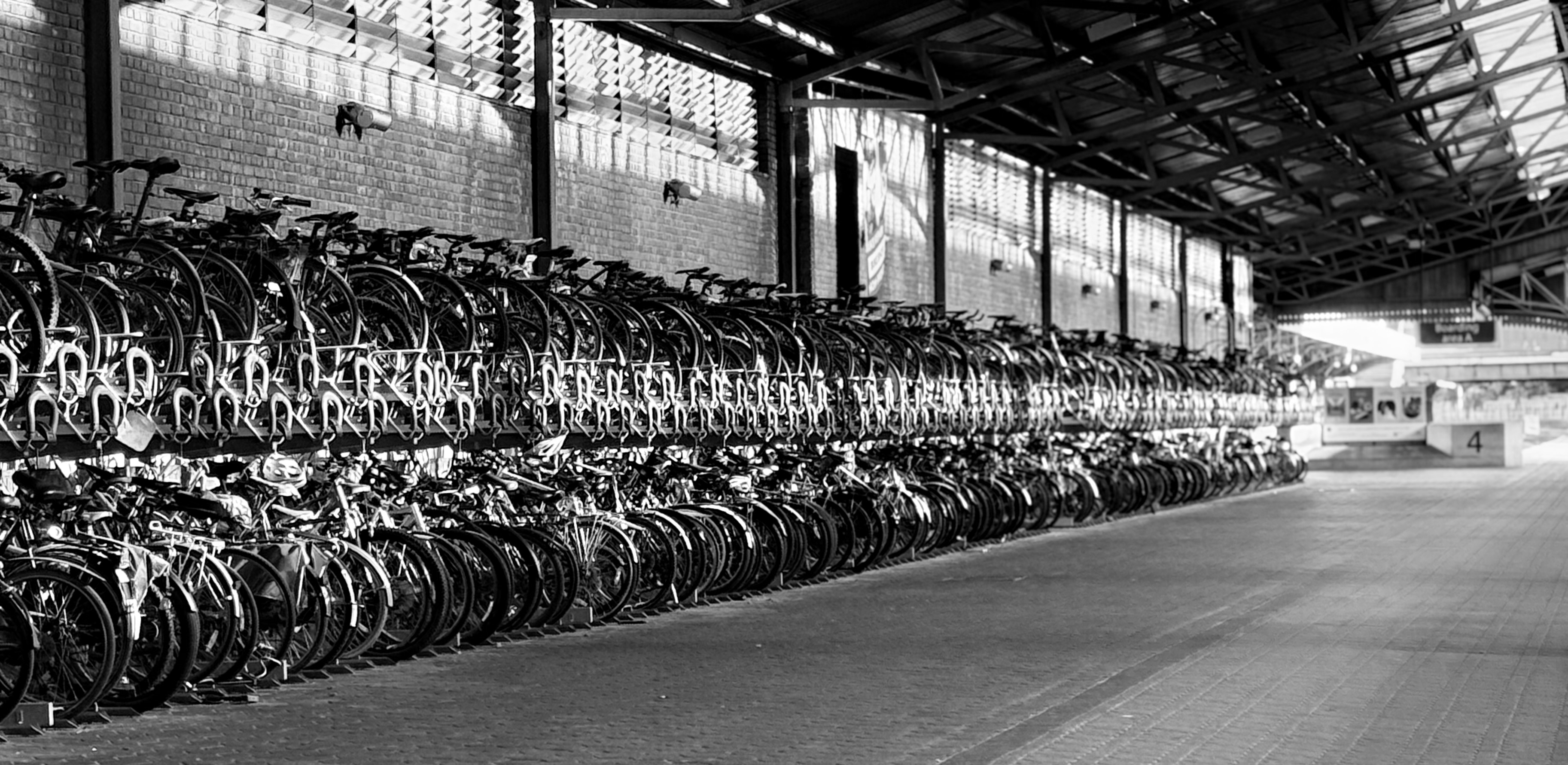 Racks of bicycles at a train station