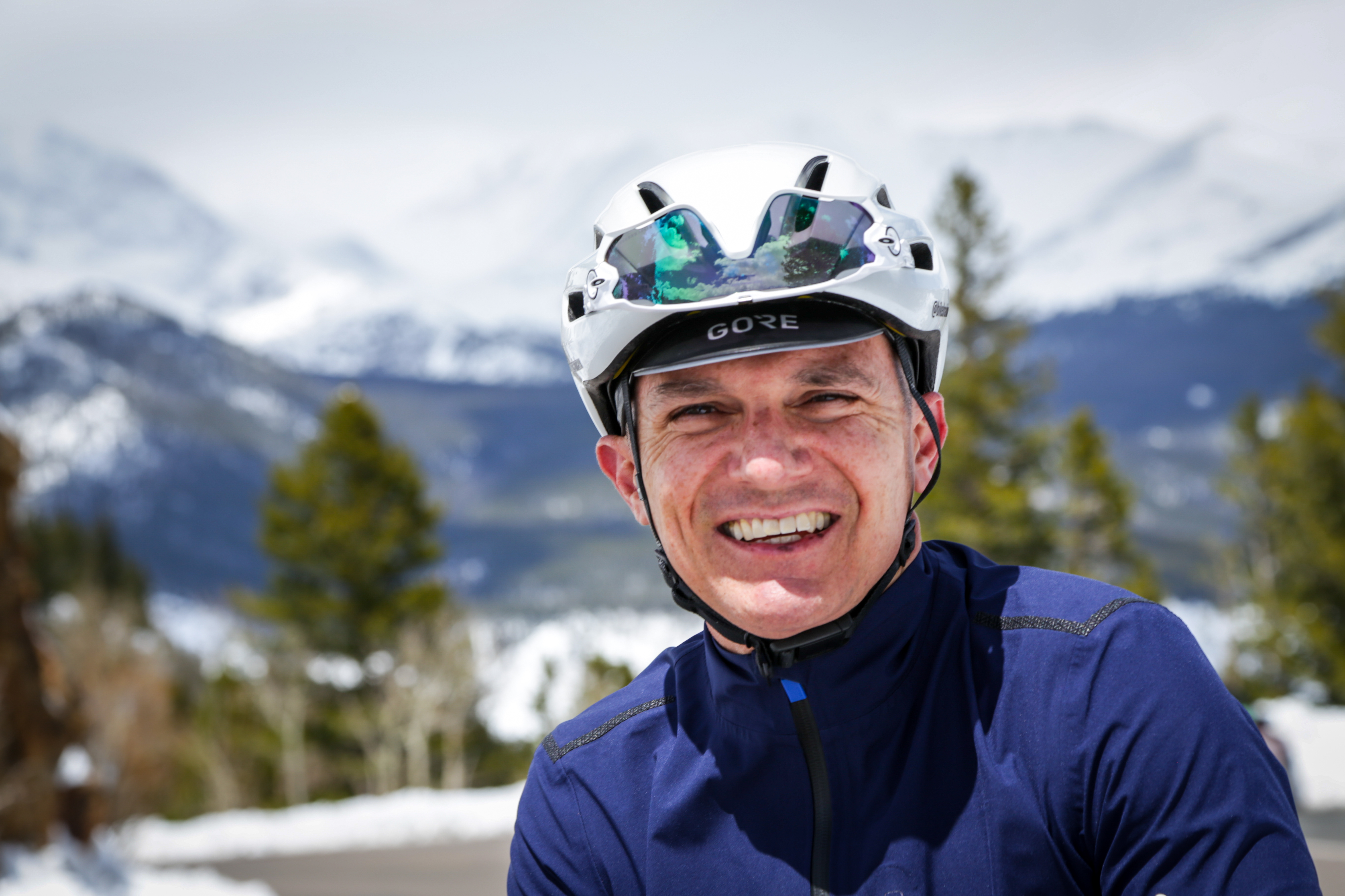 Cyclist wearing helmet in Colorado - Colorado bicycle helmet law explained by a lawyer