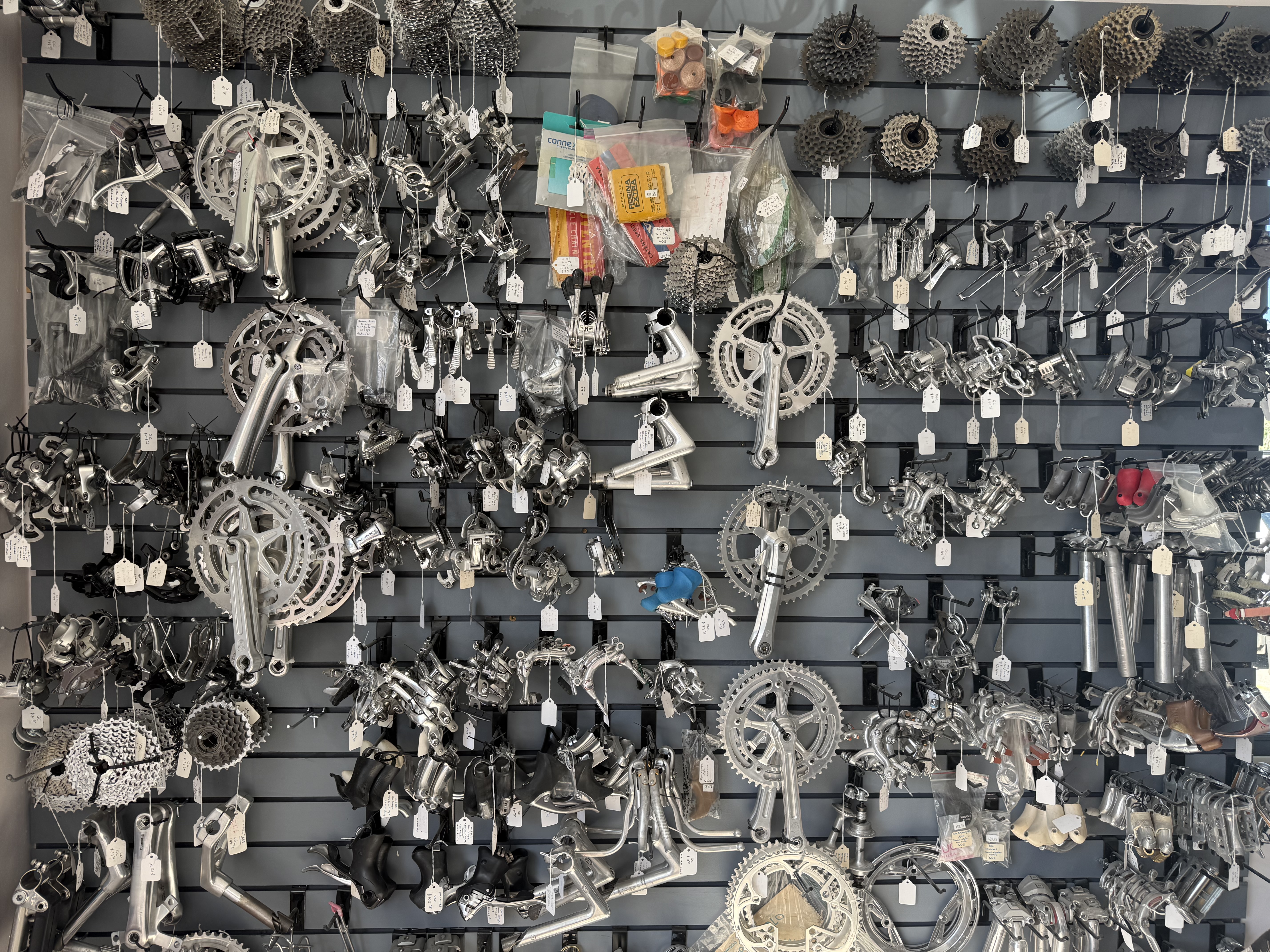 Bicycle components hanging on a wall