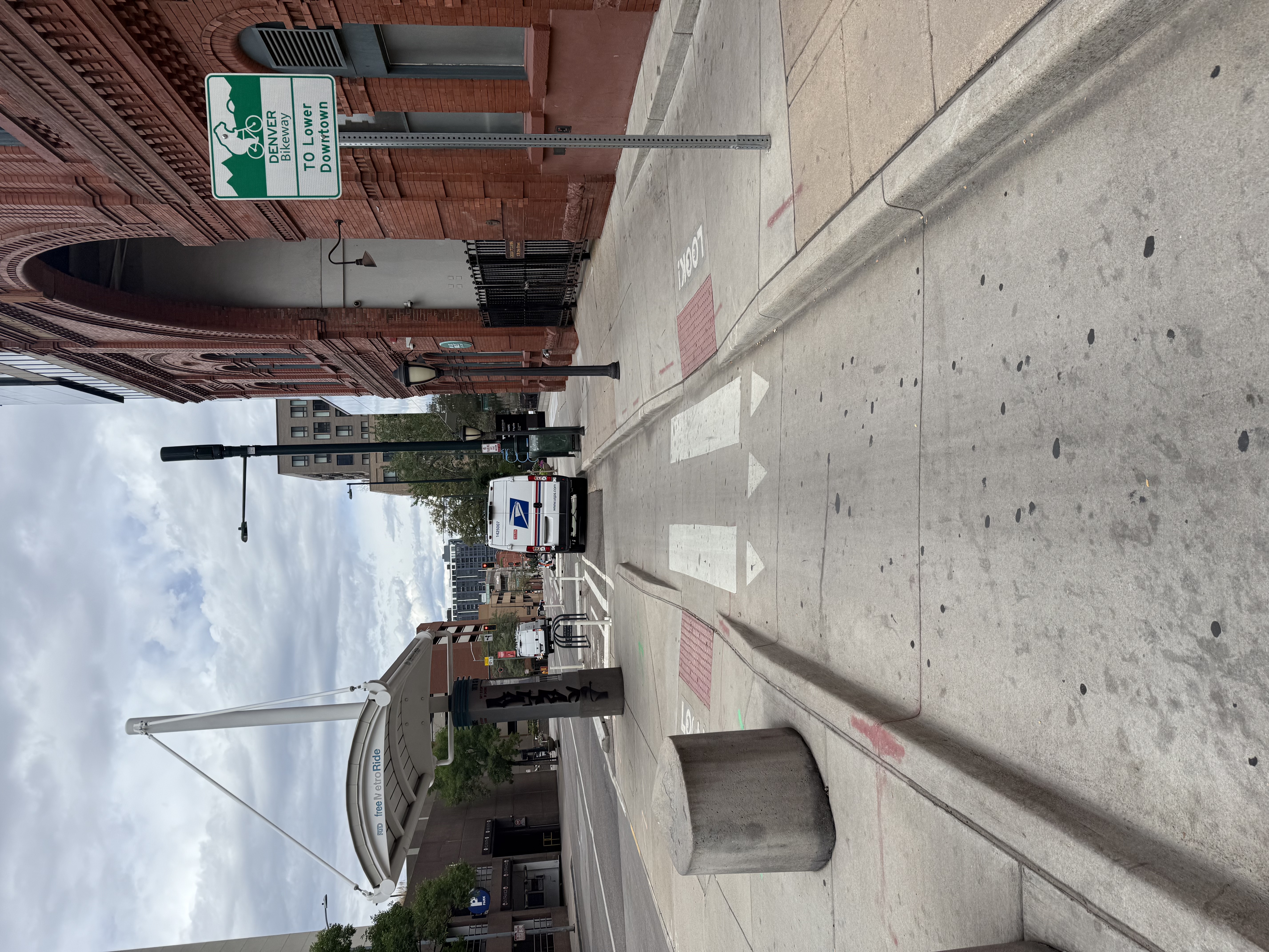 Vehicle parked in a Denver bike lane, illegal under Colorado's ban on standing, parking or stopping a vehicle in a bike-lane .